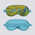 Detail showing the landscape art print on front and solid blue back of silk sleep mask - Landscape Painting