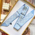 Blue and white triangle pattern faux silk twilly scarf in a stylish gift box setup - Blue