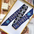 Detail of silk twilly scarf with rope print and France Paris text in a gift box - 5*90cm / Dark Blue