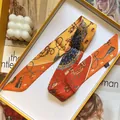 Elegante oranje en gele bedrukte zijden twilly sjaal in een geschenkverpakking - Oranje