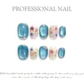 Set de faux ongles œil de chat bleu avec motifs floraux et feuilles d'or sur fond blanc - XS / Style Rond Court (W-294-短圆)