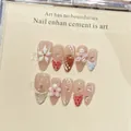 Handmade press-on nails with 3D white floral patterns and strawberry nail art designs - XS / Long Almond Shape