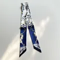 Navy blue and gold silk scarf twilly with vintage equestrian motifs on white background - Blue & White