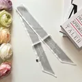 Silver-gray silk twilly ribbon with 'Love Never Fails' text for handbag handle decoration - Light Gray / 80-100cm