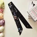 Elegant black silk twill ribbon scarf with mystic Paris prints and floral background - One Size