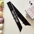 French letter print black satin twilly scarf with elegant floral backdrop - Black