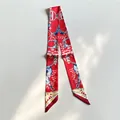 Elegant red equestrian print narrow silk scarf with horsebit pattern and gold trim - Red