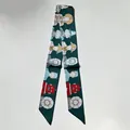 Artistic dark green silk-like twilly scarf featuring Egyptian and robot illustrations - 80-100cm / Dark Green