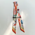 Satin skinny twilly silk scarf with colorful comic print and diagonal striped edges - Orange