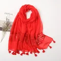 Elegant long solid red cotton scarf with lace embroidery and matching fringe tassels - Red
