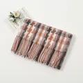 Detailed view of the soft mosaic plaid scarf with long fringe and retro check patterns - Dusty Pink Grey