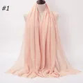 Solid light pink orange pleated cotton linen scarf with frayed edges on mannequin - 180x90cm / Light Pink Orange (#1)