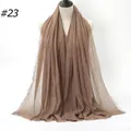 Deep brown crinkled cotton scarf featuring raw fringe edges on mannequin for women - 180x90cm / Deep Brown (#23)