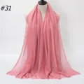 Solid dusty rose pleated cotton scarf with frayed edges for women shown on mannequin - 180x90cm / Dusty Rose (#31)