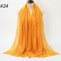 Solid bright orange pleated cotton scarf with frayed edges on a neutral mannequin - 180x90cm / Bright Orange (#24)