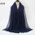 Solid crinkle cotton scarf in navy blue featuring fringe edges on a display mannequin - 180x90cm / Deep Blue (#14)