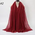 Deep red pleated cotton linen scarf with frayed edges displayed on a mannequin torso - 180x90cm / Burgundy (2#)