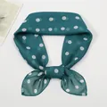 Detail of teal green polka dot chiffon scarf with lightweight translucent texture - Teal