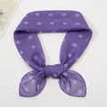 Detail of sheer purple polka dot chiffon scarf with professional machine-stitched edges - Purple