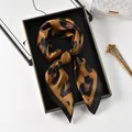 Elegant leopard print satin square scarf in brown and black hues presented in a gift box - Khaki Leopard