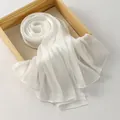 Solid white linen-cotton blend scarf with translucent vertical stripe texture on a wooden tray - Standard Specification / White