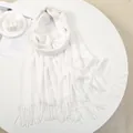 Close-up of white cashmere-feel scarf showing soft knit texture and long tassels - 180-70cm / White