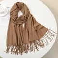 Detailed view of warm brown cashmere-feel scarf with elegant twisted fringe tassels - 180-70cm / Camel