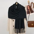 Detail of solid black faux cashmere scarf with tassels and Hand Made woven label - 188x70cm / Black