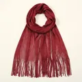 Detail of burgundy mesh shawl with metallic glitter finish and long decorative fringes - Burgundy