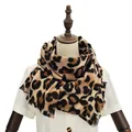 Detail of classic leopard print scarf featuring soft cashmere-like fabric and delicate fringe - Leopard Print