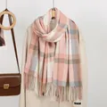 Detail of soft plaid scarf with tassels in pink, grey and white on a beige coat - 182*66cm / Pink