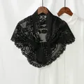 Detailed view of black floral lace triangle scarf with intricate scalloped hollow edges - Black