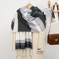 Detail of geometric knit shawl with black and purple patterns and long white tassels - YR353-01# Black Grey