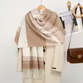 Close-up of beige and brown geometric knit scarf with tassels on wool coat detail - YR353-02# Khaki White