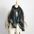 Detail of navy blue and dark green paisley cotton linen shawl on a wool coat - Navy Blue