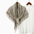 Fashionable leopard print cashmere-like scarf with fringe edges hung on a hanger - 1# Gray White