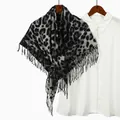 Detailed view of leopard print square scarf with fringes on a white shirt background - 3# Black Gray