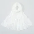 Detail of a lightweight white sheer scarf with soft silky texture and subtle shimmer - White