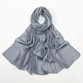 Close-up of dark grey linen-feel scarf showing vertical pleated texture and sheer fabric - 180x75cm / Dark Gray