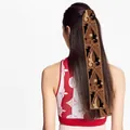 Detail of vintage patterned silk hair ribbon tied in long hair for a stylish look - 120x8CM / Coffee Brown Retro Vine (Color 2)