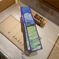 Detailed macro view of oil painting style silk ribbon with artistic blue and green strokes - Color 4 (Artistic)