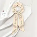 Elegant beige silk ribbon scarf with rose flower print styled on a silk strap dress - Light Pink Rose (Orange Red)