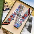 Floral twilly silk scarf in blue with luxury green textured gift box and washing label detail - Gray