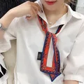 Narrow silk scarf with red, white and blue floral pattern on 100% polyester fabric - Red