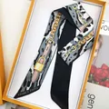 Elegant leopard print silk scarf with golden chain patterns in a luxury gift box packaging - Gray