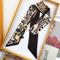 Leopard print twilly silk scarf with gold chain patterns in an orange gift box - Brown