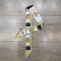 Detail of a silk twilly scarf with equestrian horse buckle prints and slanted ends - Champagne