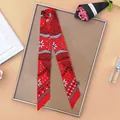 Red twilly silk scarf for handbag handle featuring white stars and floral patterns - Red