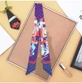 Detail of dark purple silk twilly scarf with red heart and classic carriage patterns - Dark Blue