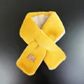 Detail of faux rabbit fur scarf showing cross-over design and soft plush texture - Dark Yellow